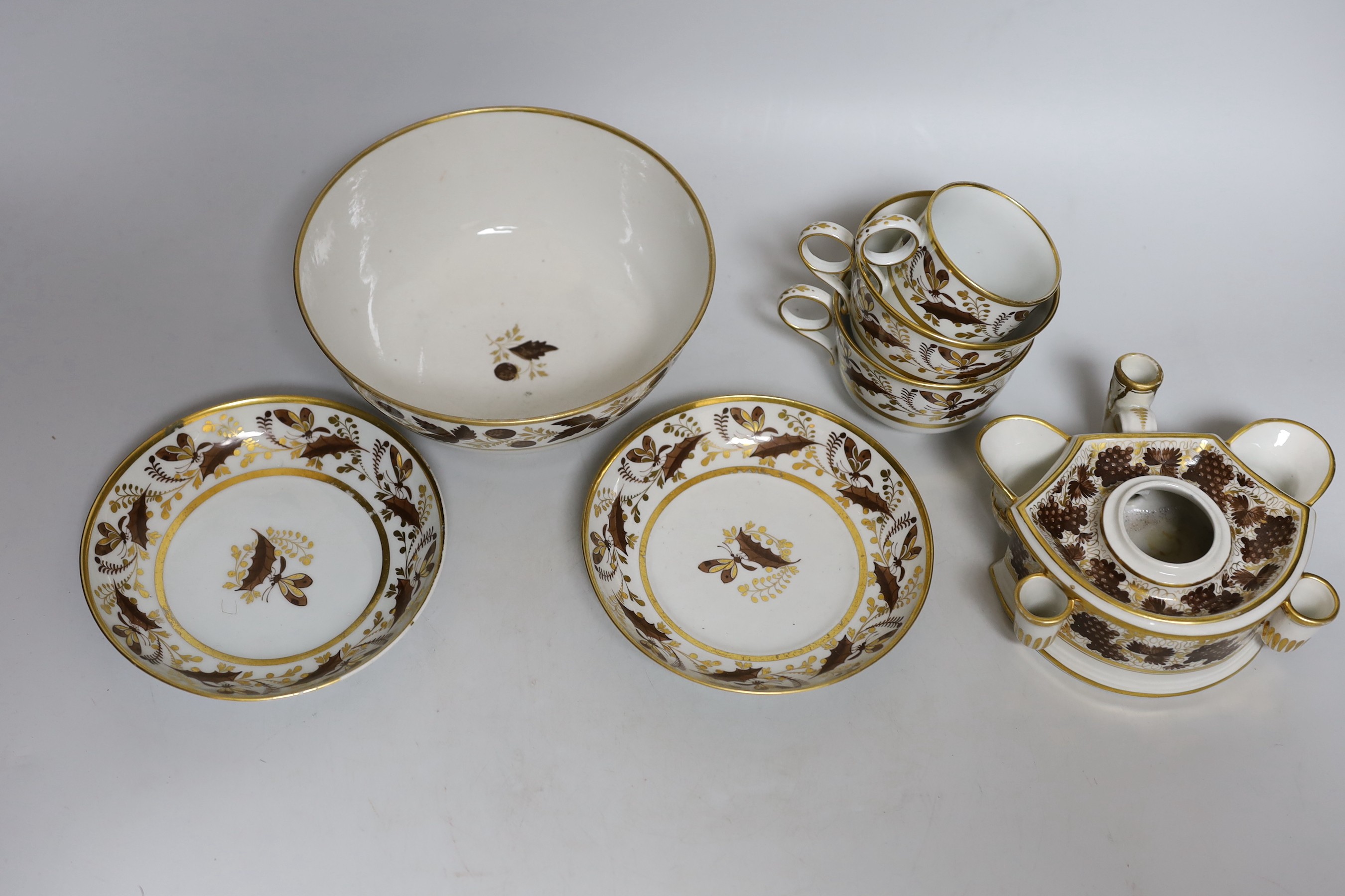Flight and Barr, Worcester brown enamelled and gilded inkstand, two trios and a similar slops bowl, c.1795, incised B marks